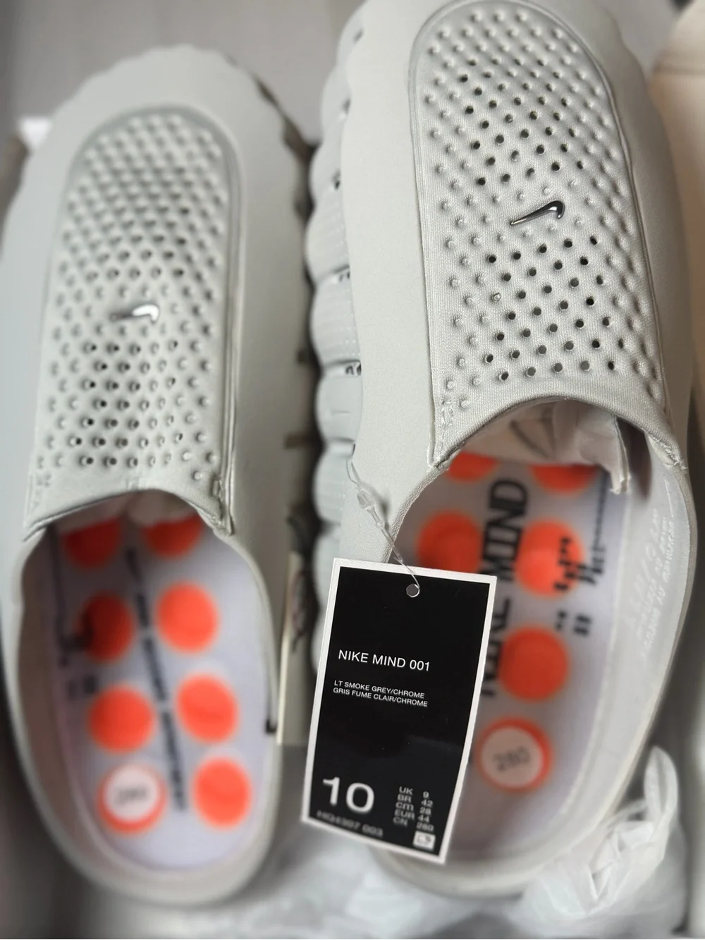 Nike Men’s White Slide Sandals with Orange Outsole Pods